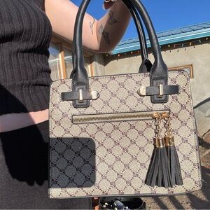 Elegant Black and Cream Handbag